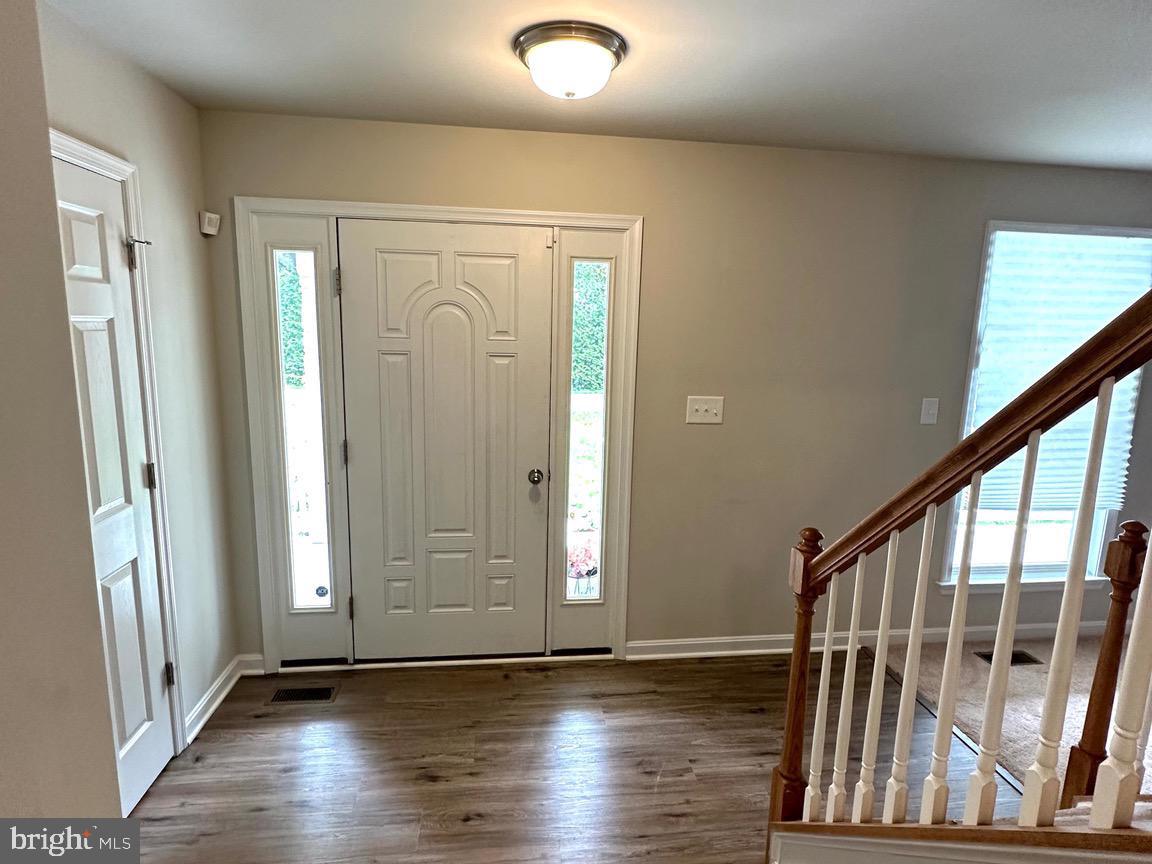 205 Azalea Road Colonial Beach, VA 22443 - Photo 3 of 48 Foyer w/ luxury vinyl