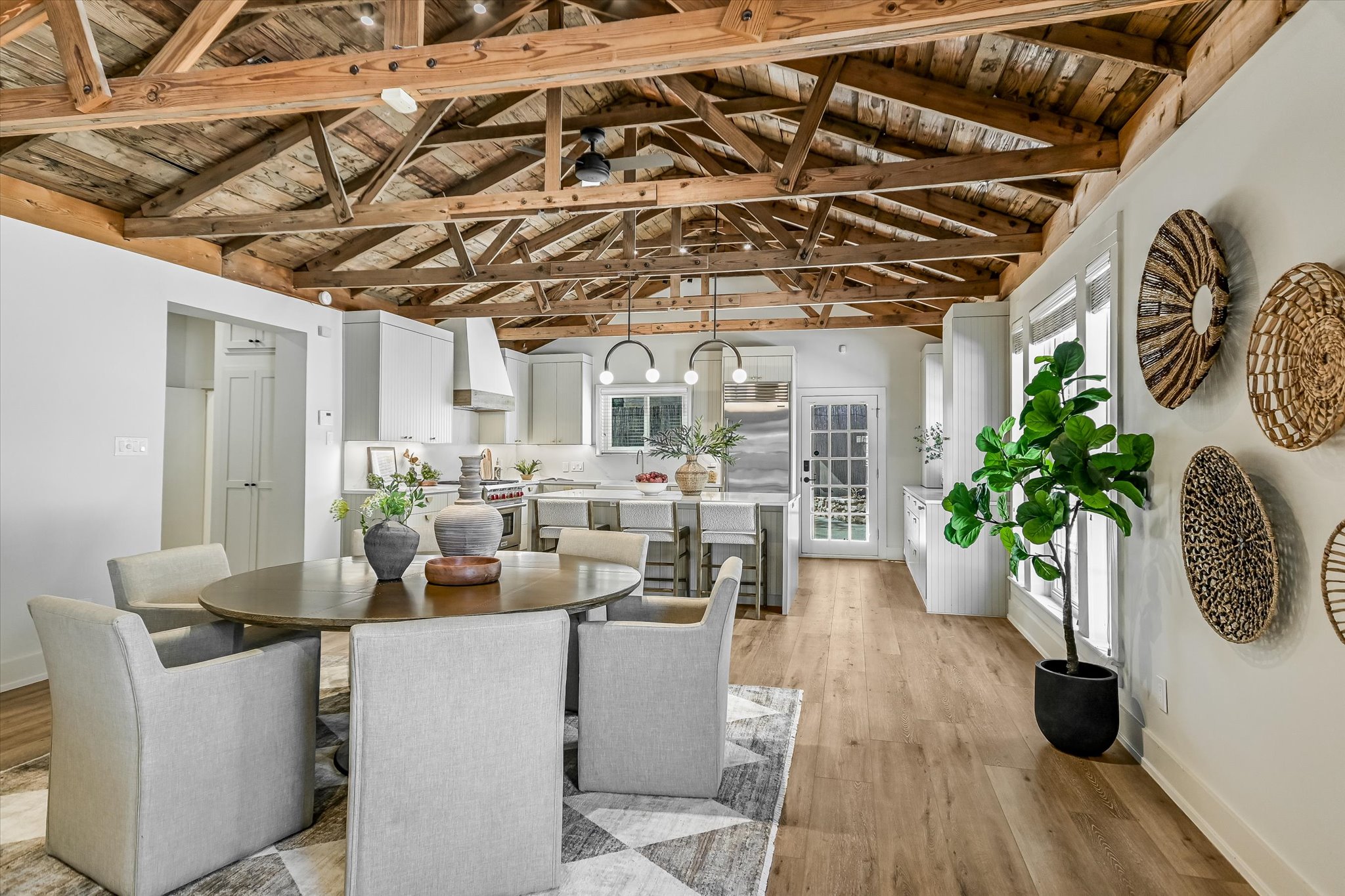 6111 Hudson Bend Road Austin, TX 78734 - Photo 8 of 40 Dining space with a wooden ceiling with exposed beams and light wood-type flooring