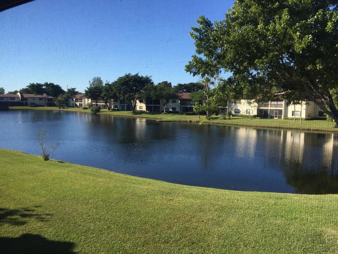 21863 Arriba Real, Unit 8K Boca Raton, FL 33433 - Photo 1 of 26 LAKE VIEW