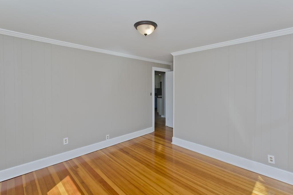 67 Colemore Street Feeding Hills, MA 01030 - Photo 15 of 42 a view of an empty room with wooden floor