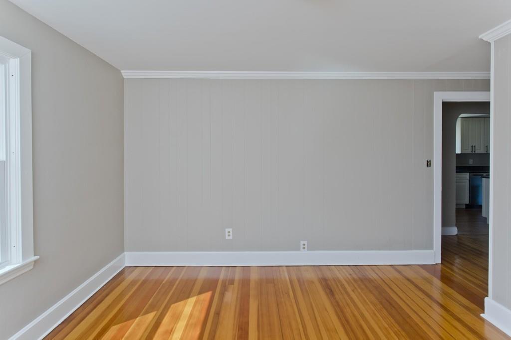 67 Colemore Street Feeding Hills, MA 01030 - Photo 16 of 42 a view of an empty room with wooden floor and a window