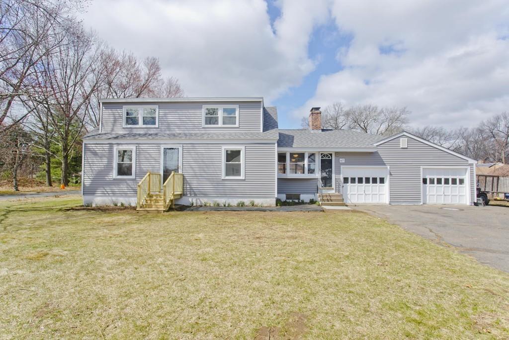 67 Colemore Street Feeding Hills, MA 01030 - Photo 2 of 42 a front view of a house with a yard