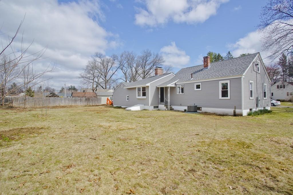 67 Colemore Street Feeding Hills, MA 01030 - Photo 3 of 42 a front view of house with yard