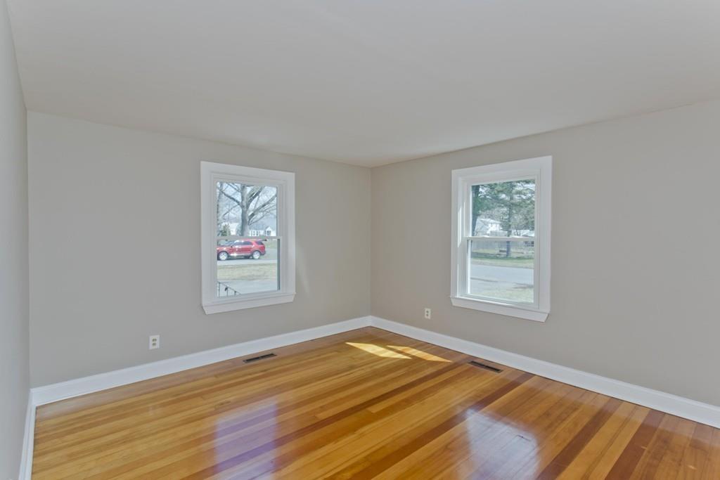 67 Colemore Street Feeding Hills, MA 01030 - Photo 33 of 42 a view of an empty room with wooden floor and a window
