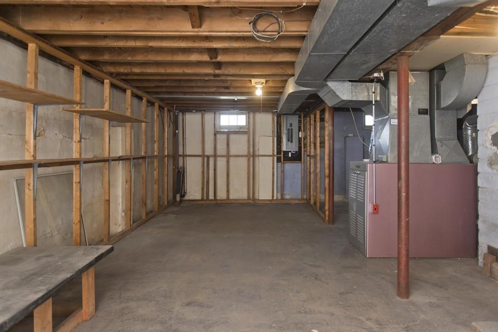 67 Colemore Street Feeding Hills, MA 01030 - Photo 42 of 42 a view of water heater room with stairs