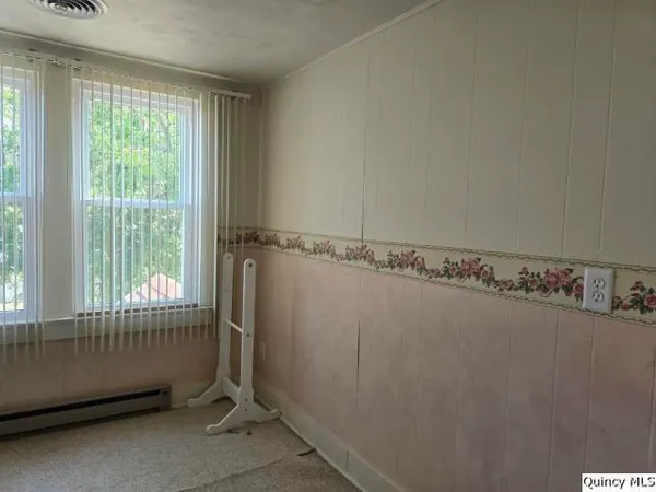 a view of a room with rack on the wall