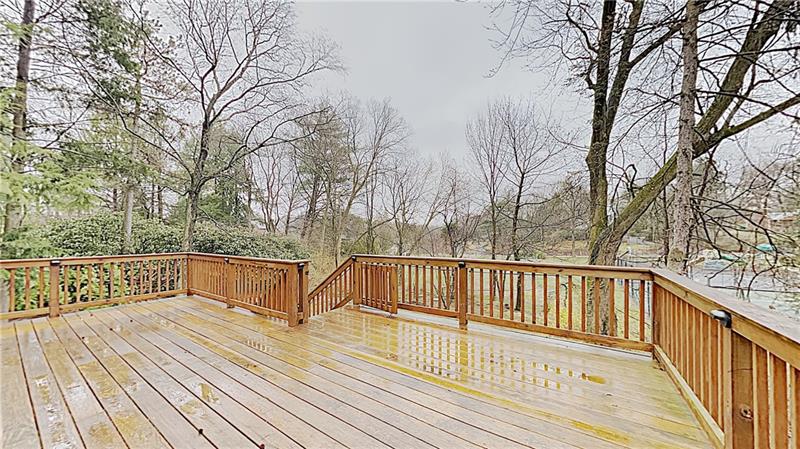 10 Penhurst Road Pittsburgh, PA 15202 - Photo 23 of 25 Expanded deck with stairs to rear yard