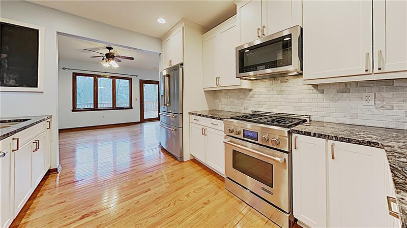10 Penhurst Road Pittsburgh, PA 15202 - Photo 7 of 25 Renovated kitchen with Jenn Aire gas range