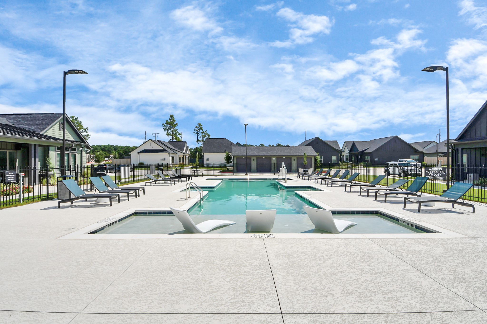 7711 Longmire Road, Unit 32 Conroe, TX 77304 - Photo 20 of 48 Enjoy an abundance of Amenities:Resort-Style Pool w/Sundeck Ledge&Outdoor Lounge Areas w/Grilling area,Gaming Lawn,Pickleball Court,Quaint Dog Park for your fur babies!24/7 Fitness Center w/Kids Play Zone area.Stunning Clubhouse w/Café/Lounge.Playground Area.Electric Vehicle Charging Stations!
