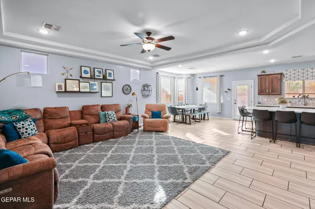 a living room with a couch and a flat screen tv