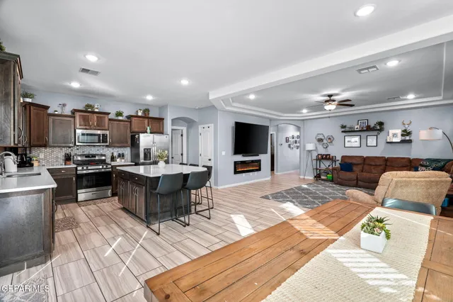 a bedroom with a bed and a desk in it