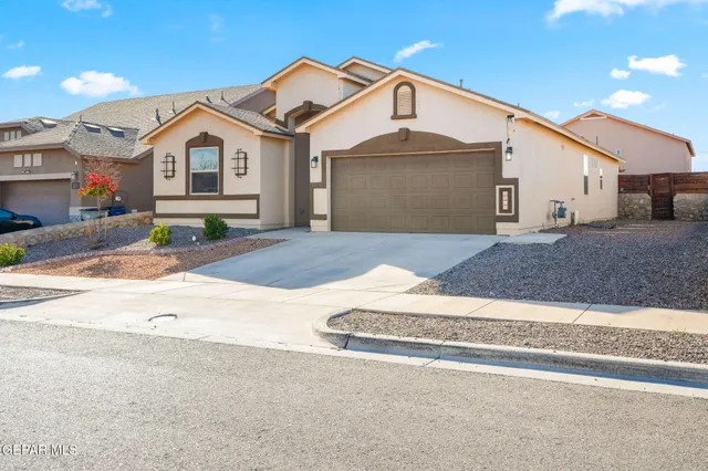 front view of a house with a bench