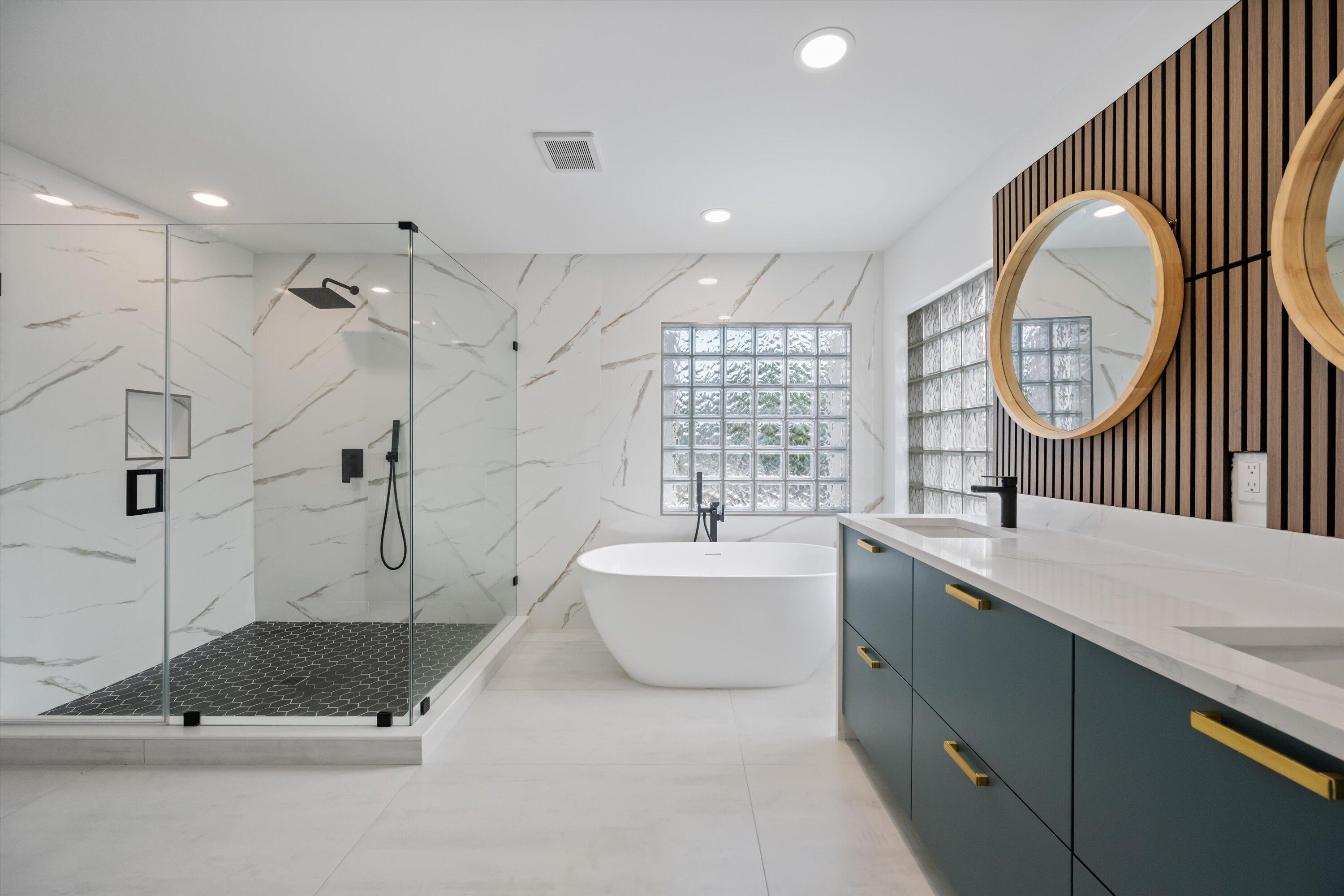 1222 Rose Gate Boulevard Riviera Beach, FL 33404 - Photo 17 of 29 a bathroom with a sink a toilet and a mirror