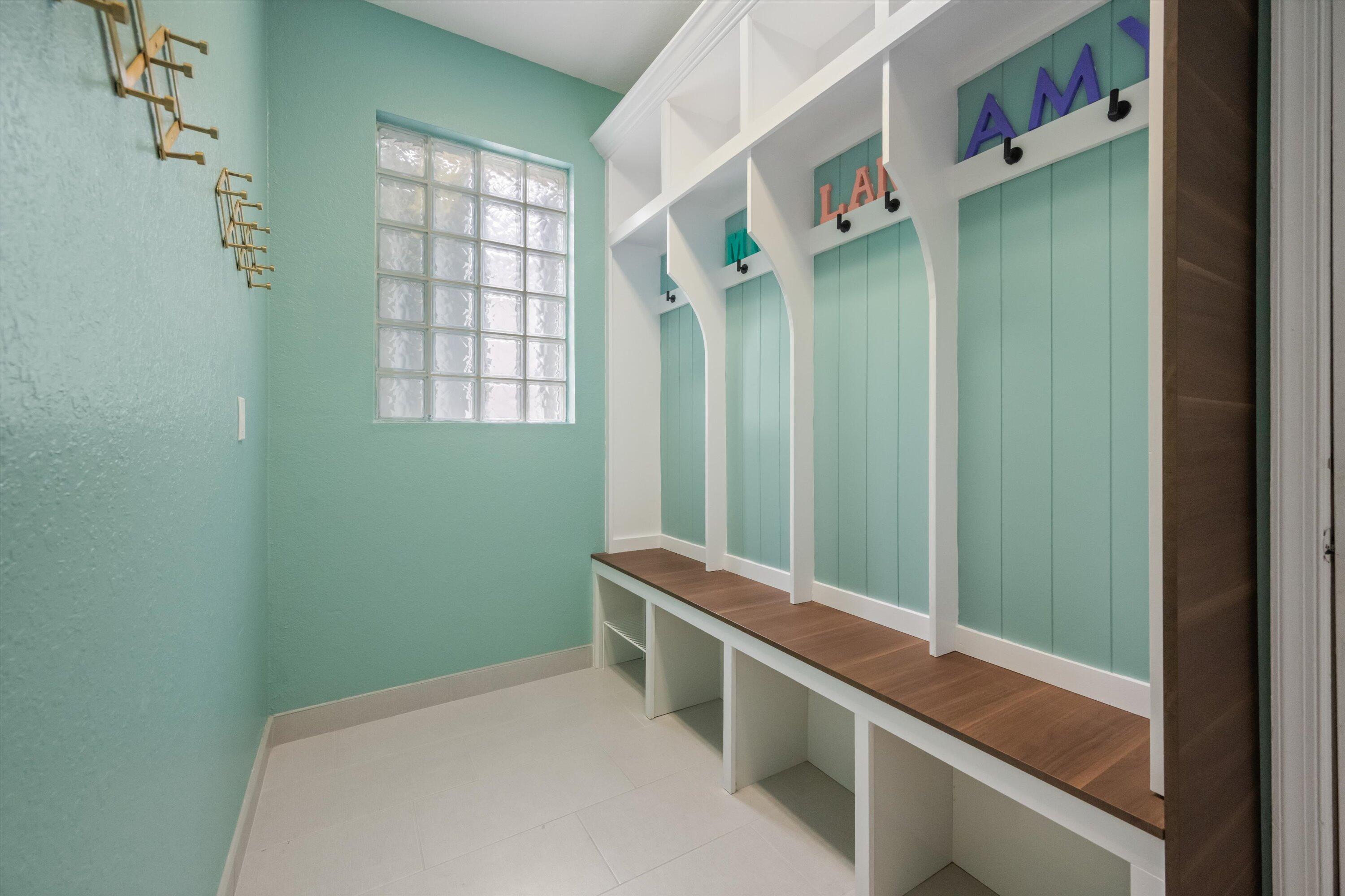 1222 Rose Gate Boulevard Riviera Beach, FL 33404 - Photo 28 of 29 a room with a window and a shower