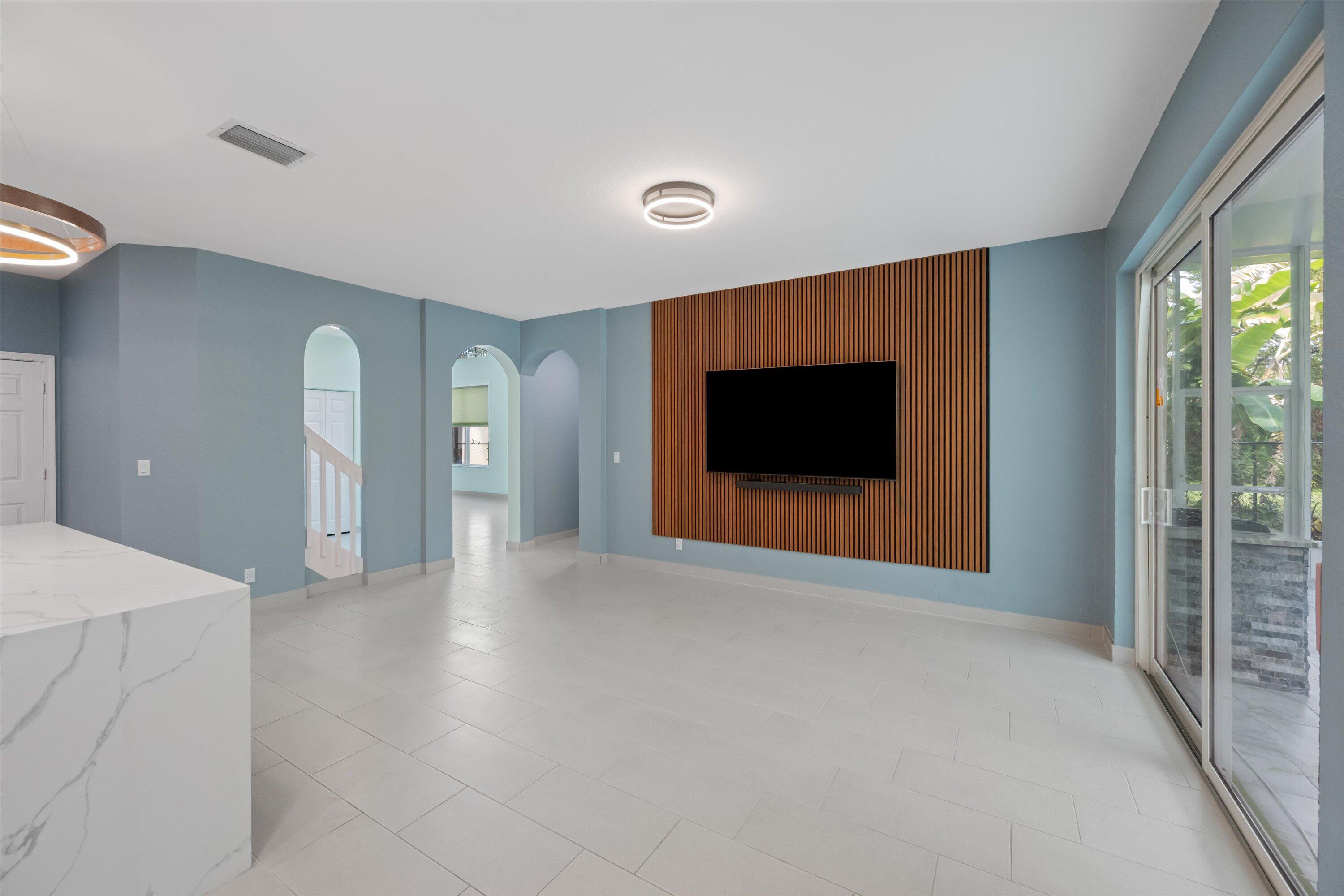 1222 Rose Gate Boulevard Riviera Beach, FL 33404 - Photo 8 of 29 a view of empty room with front door