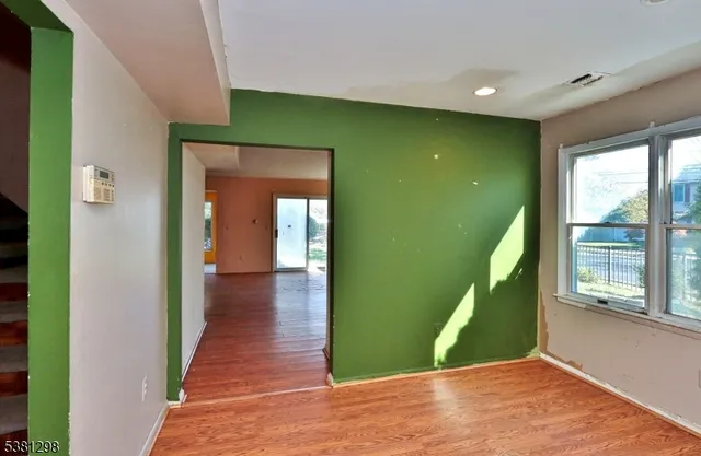 a view of a hallway with windows