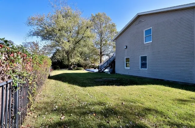 a view of a back yard of the house
