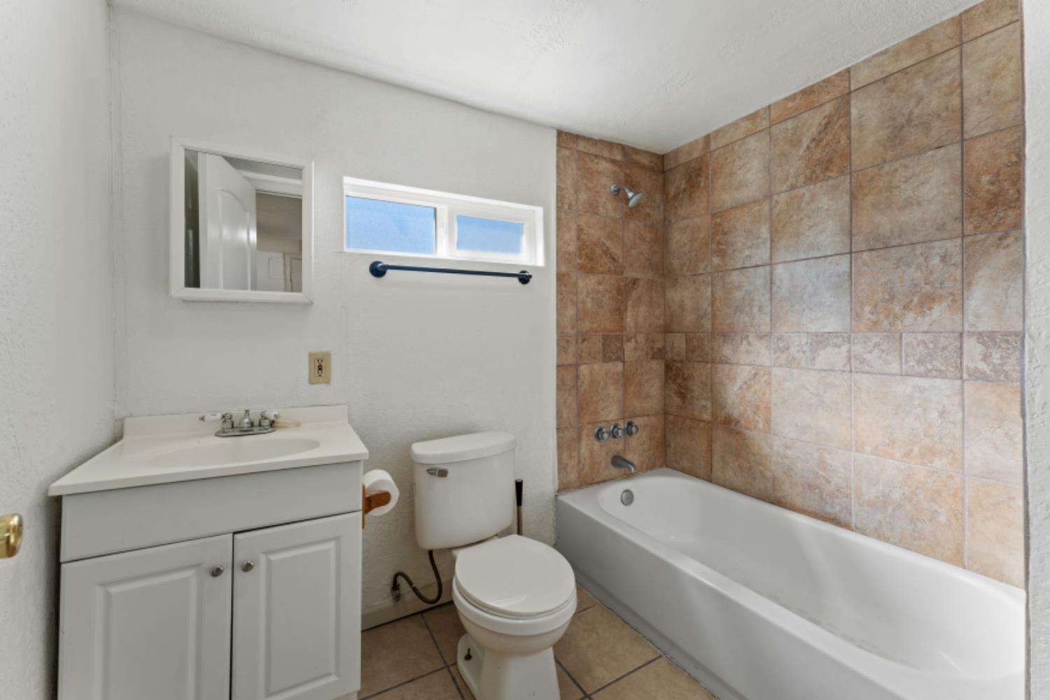 5192 Chestnut Road Olivehurst, CA 95961 - Photo 12 of 24 a bathroom with a sink toilet and shower