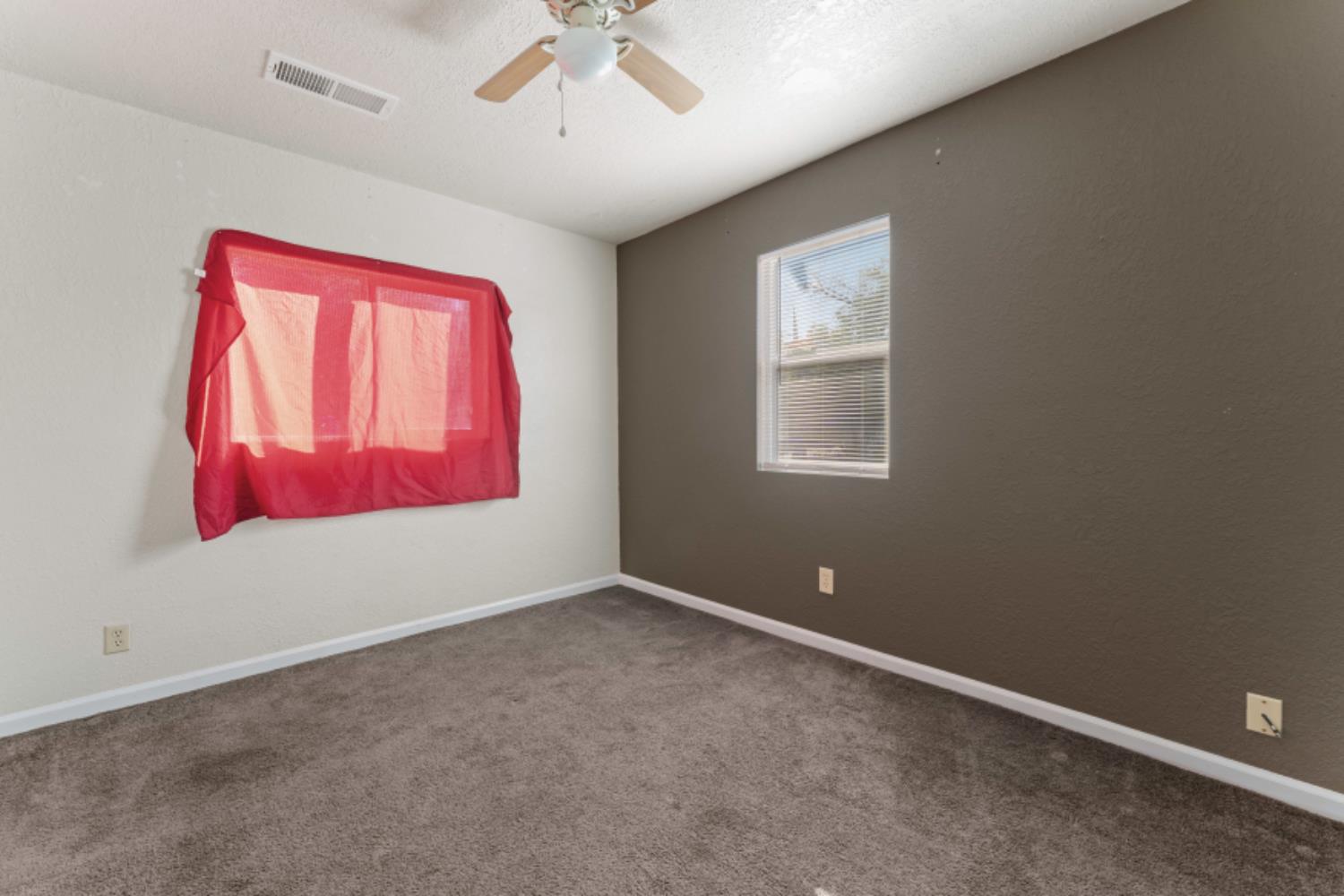 5192 Chestnut Road Olivehurst, CA 95961 - Photo 15 of 24 a view of an empty room with a window