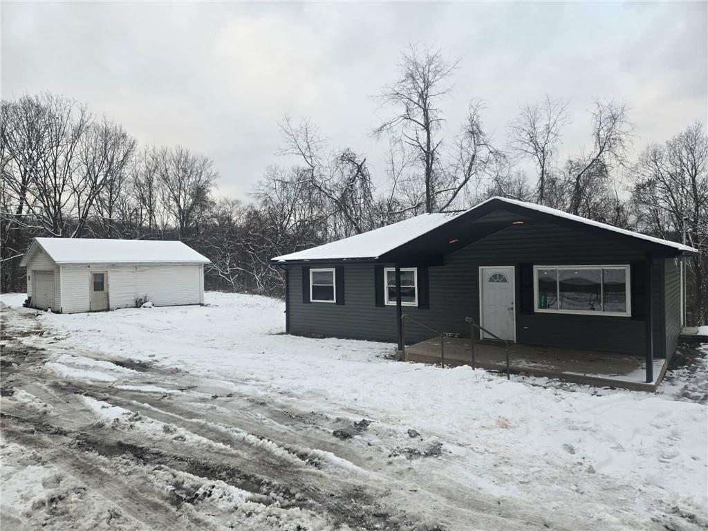 504 Queenstown Road Karns City, PA 16041 - Photo 16 of 18 a house with trees in the background