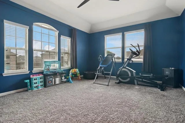 a view of a room with gym equipment