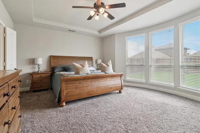 a bed room with furniture and a window