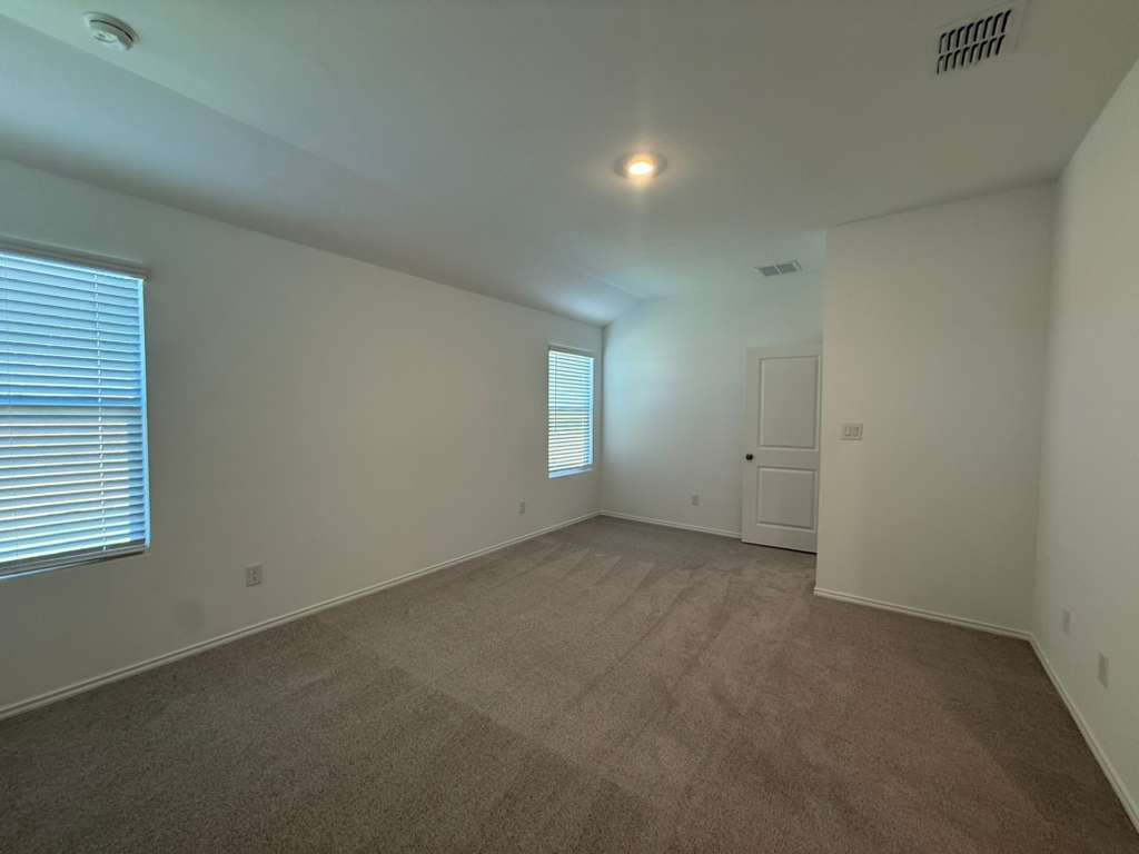 569 Sormonne Loop Kyle, TX 78640 - Photo 23 of 40 an empty room with a window