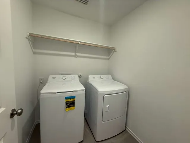 a view of a backyard with a tub