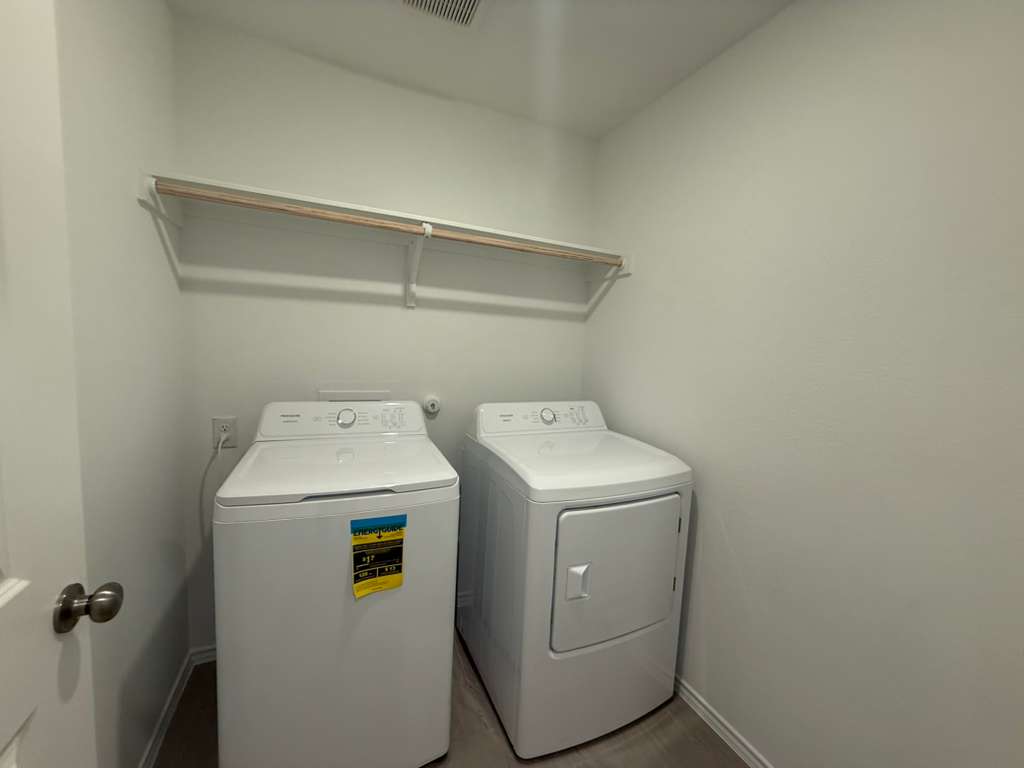 569 Sormonne Loop Kyle, TX 78640 - Photo 31 of 40 a utility room with dryer and washer