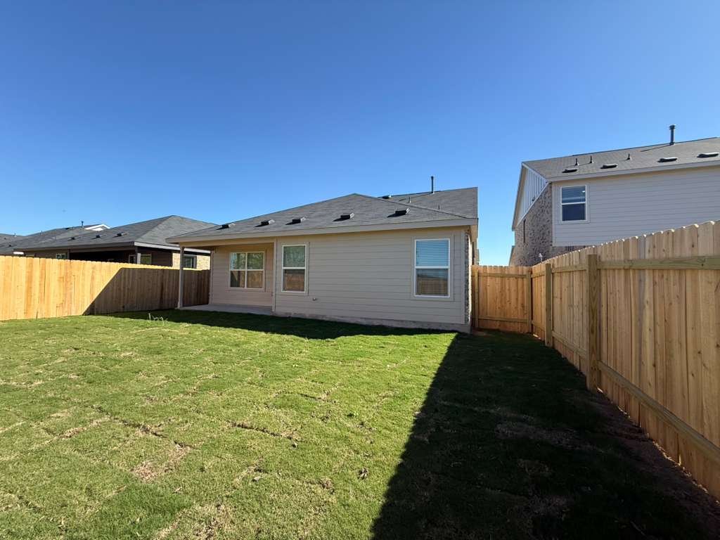 569 Sormonne Loop Kyle, TX 78640 - Photo 33 of 40 a view of a backyard of the house