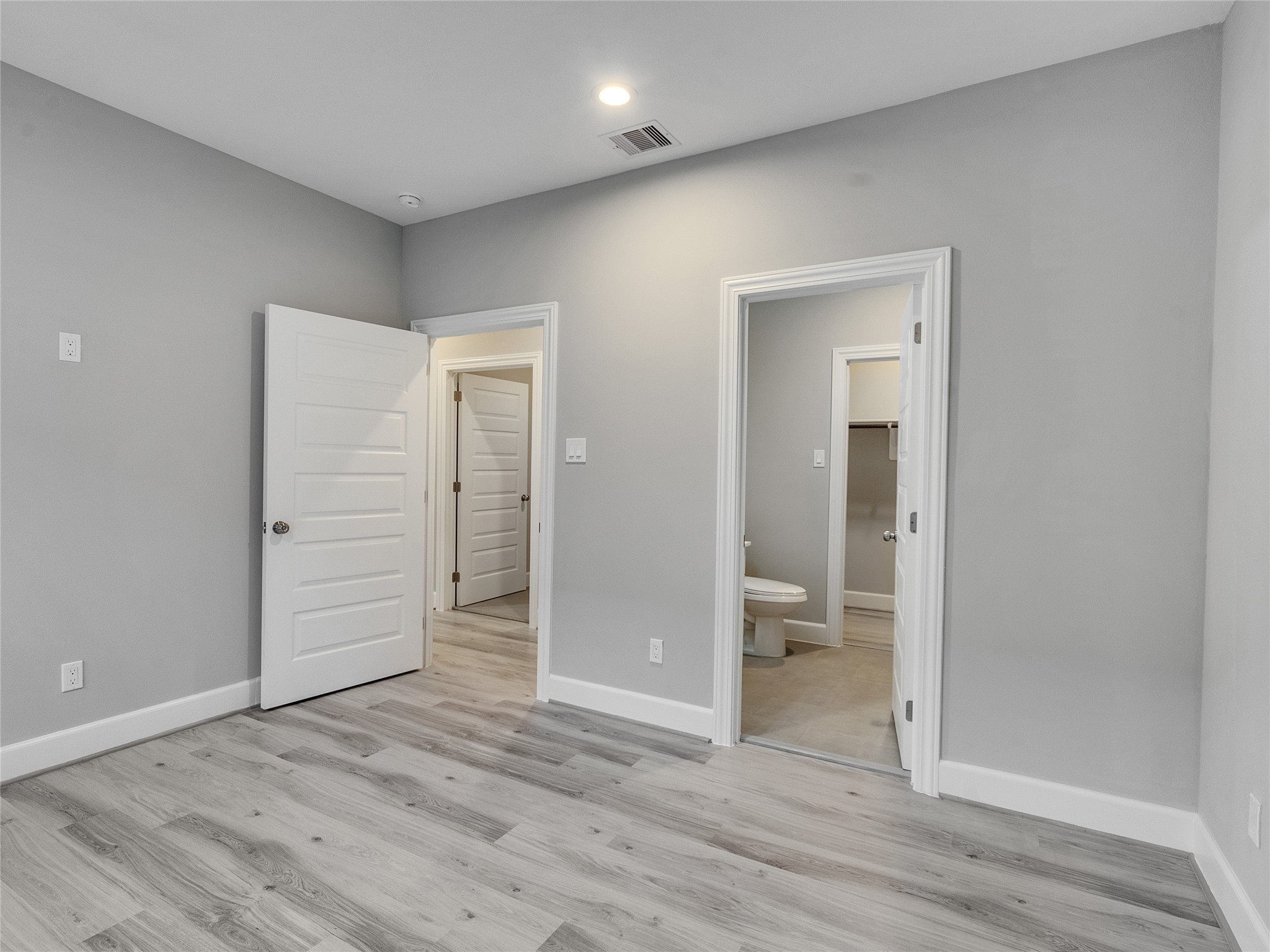 1122 West 16th Street, Unit D Houston, TX 77008 - Photo 27 of 40 wooden floor in an empty room
