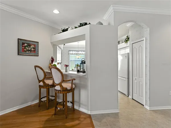 a kitchen with stainless steel appliances white cabinets and a sink