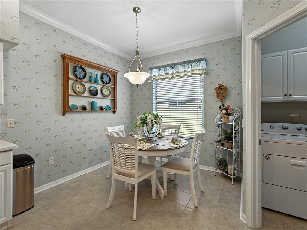 2530 Cross More Street Valrico, FL 33594 - Photo 34 of 61 a view of a dining room that has a table and chairs