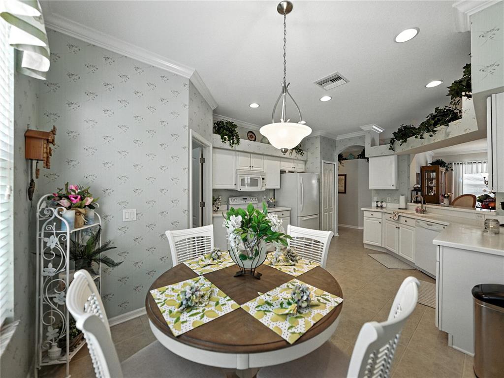 2530 Cross More Street Valrico, FL 33594 - Photo 36 of 61 a view of a dining room with furniture