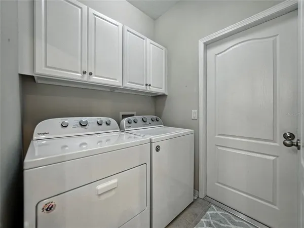 a bathroom with a shower and a toilet