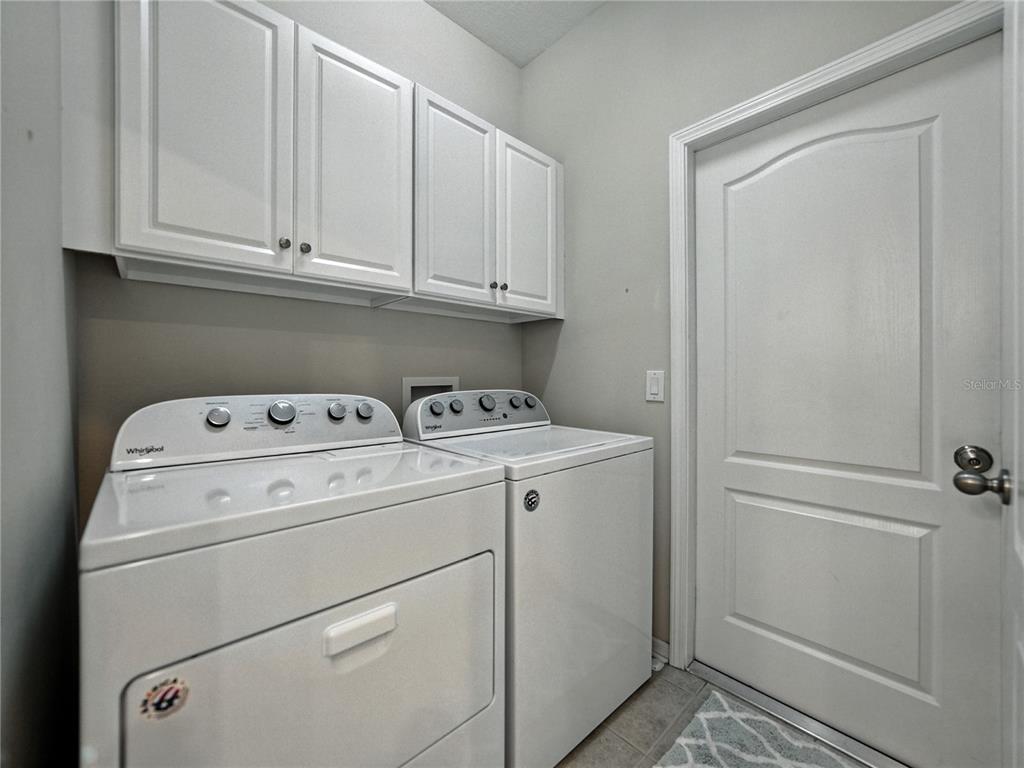 2530 Cross More Street Valrico, FL 33594 - Photo 37 of 61 a utility room with dryer and washer