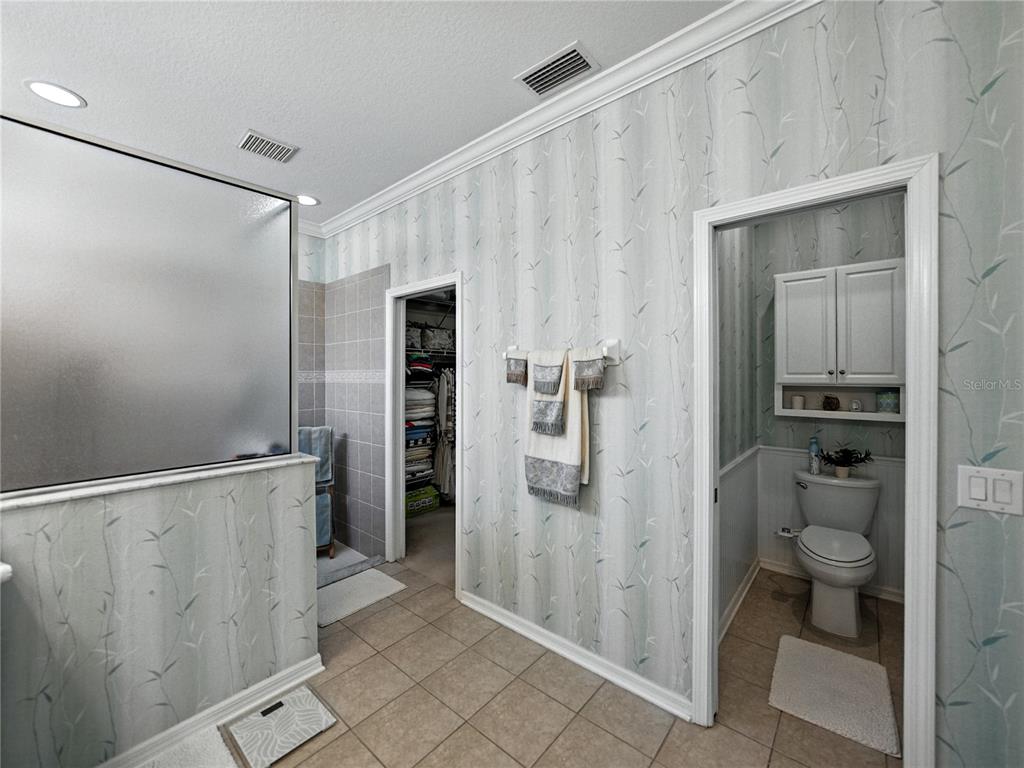 2530 Cross More Street Valrico, FL 33594 - Photo 44 of 61 a bathroom with a shower and a toilet