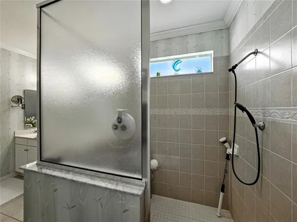 a view of a patio with table and chairs