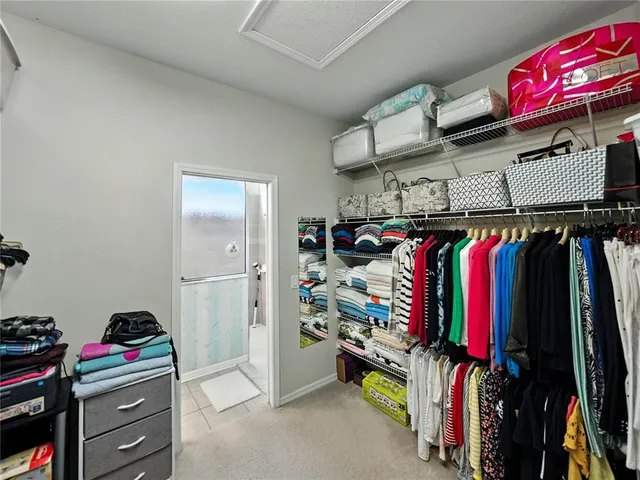 a view of a swimming pool with sitting area