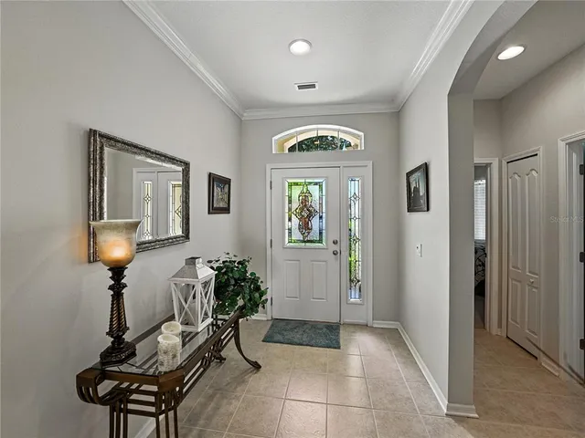 a view of a livingroom with furniture and a flat screen tv