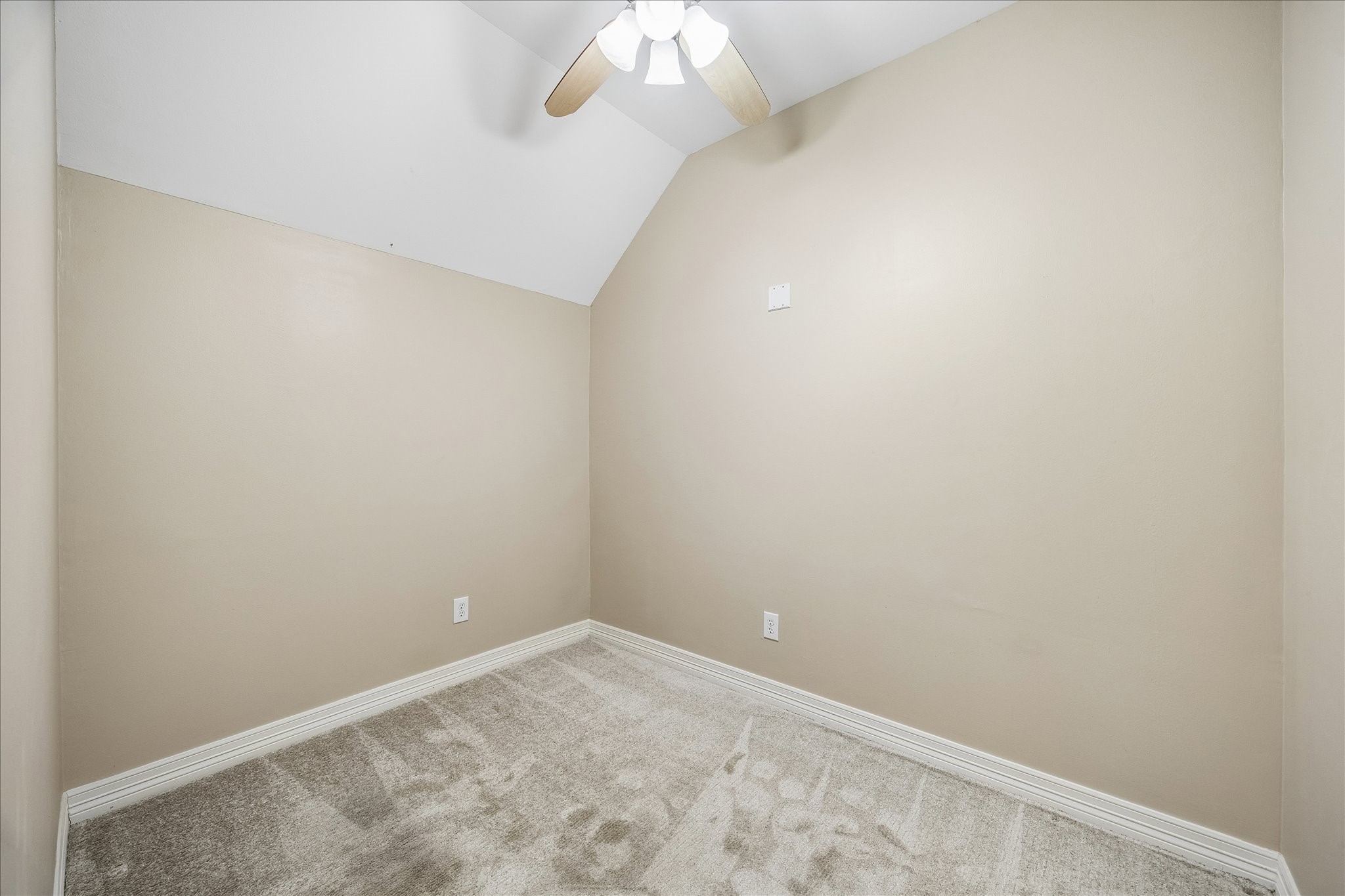 2423 Ralph Street Houston, TX 77006 - Photo 21 of 24 an empty room with a chandelier fan and closet