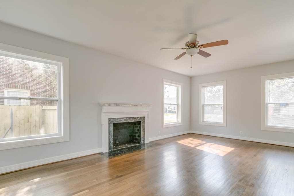 3321 Charleston Street Houston, TX 77021 - Photo 12 of 32 a view of empty room with wooden floor and fan view