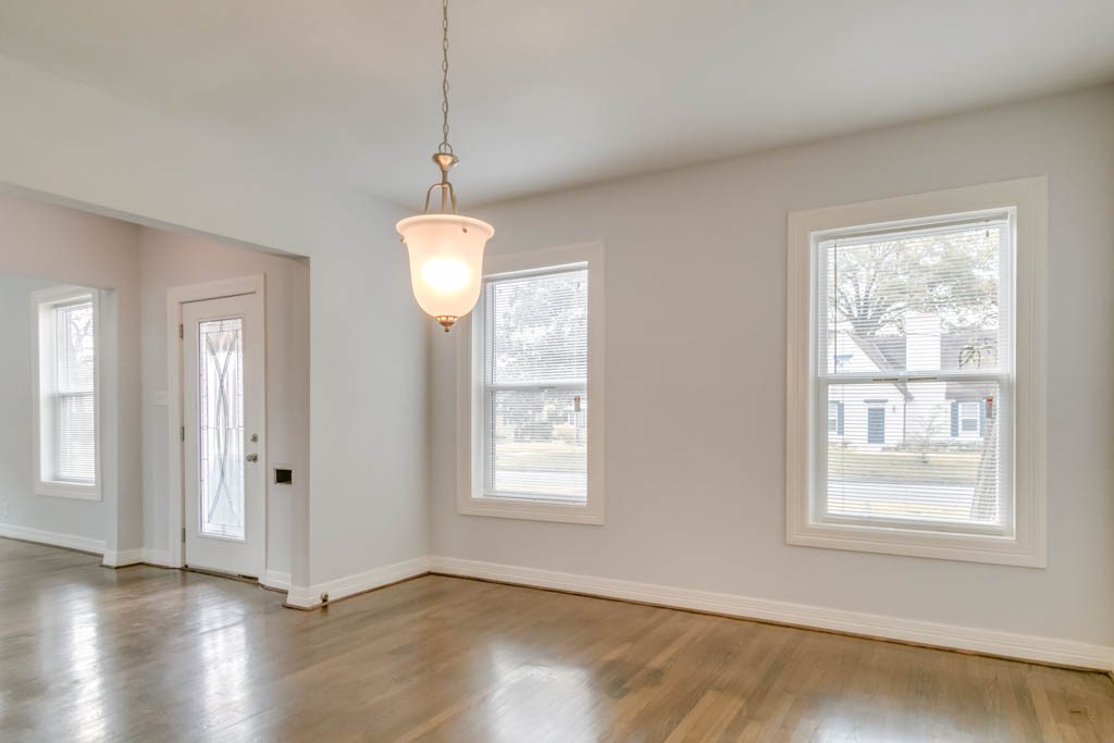 3321 Charleston Street Houston, TX 77021 - Photo 13 of 32 a view of an empty room with wooden floor and a window