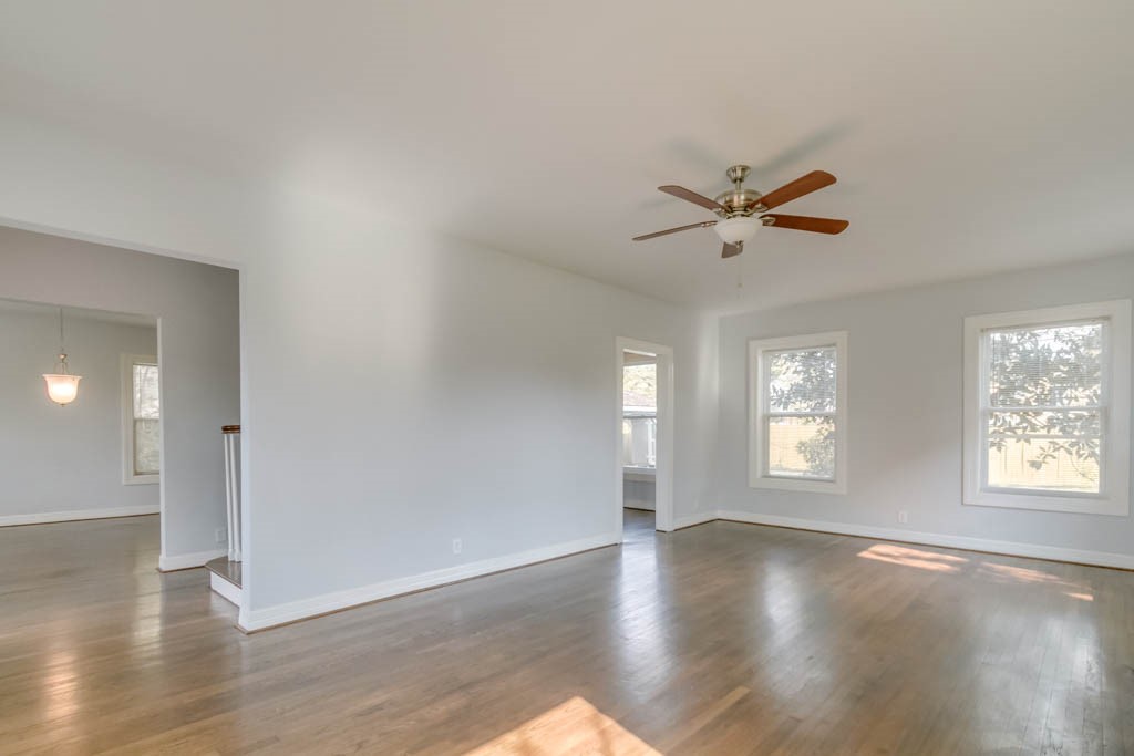3321 Charleston Street Houston, TX 77021 - Photo 16 of 32 an empty room with wooden floor and windows