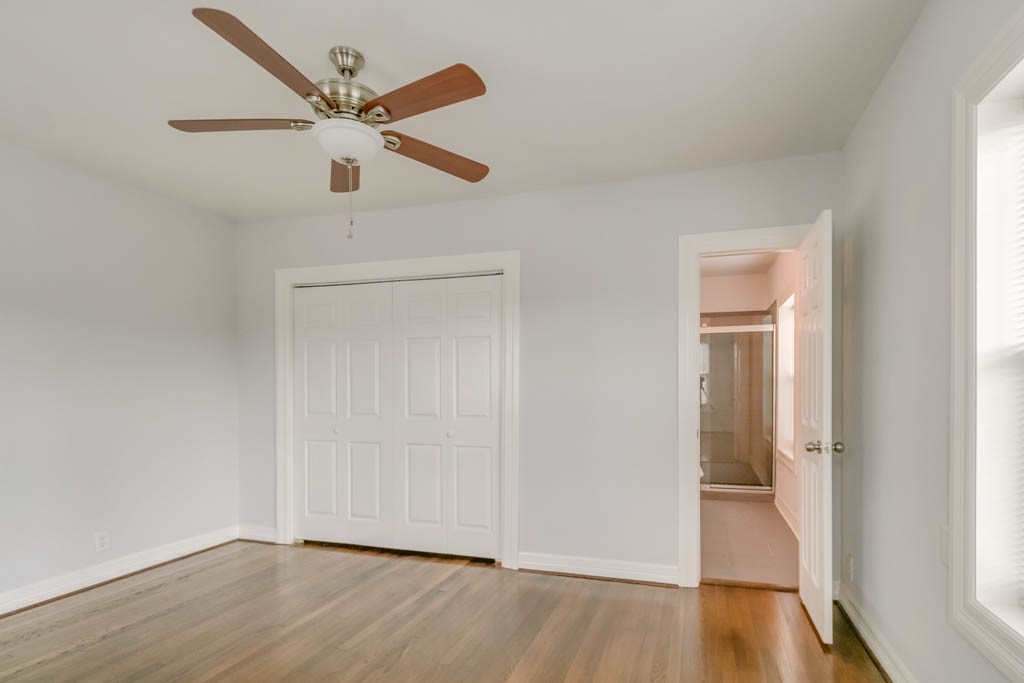 3321 Charleston Street Houston, TX 77021 - Photo 22 of 32 wooden floor in an empty room with a window