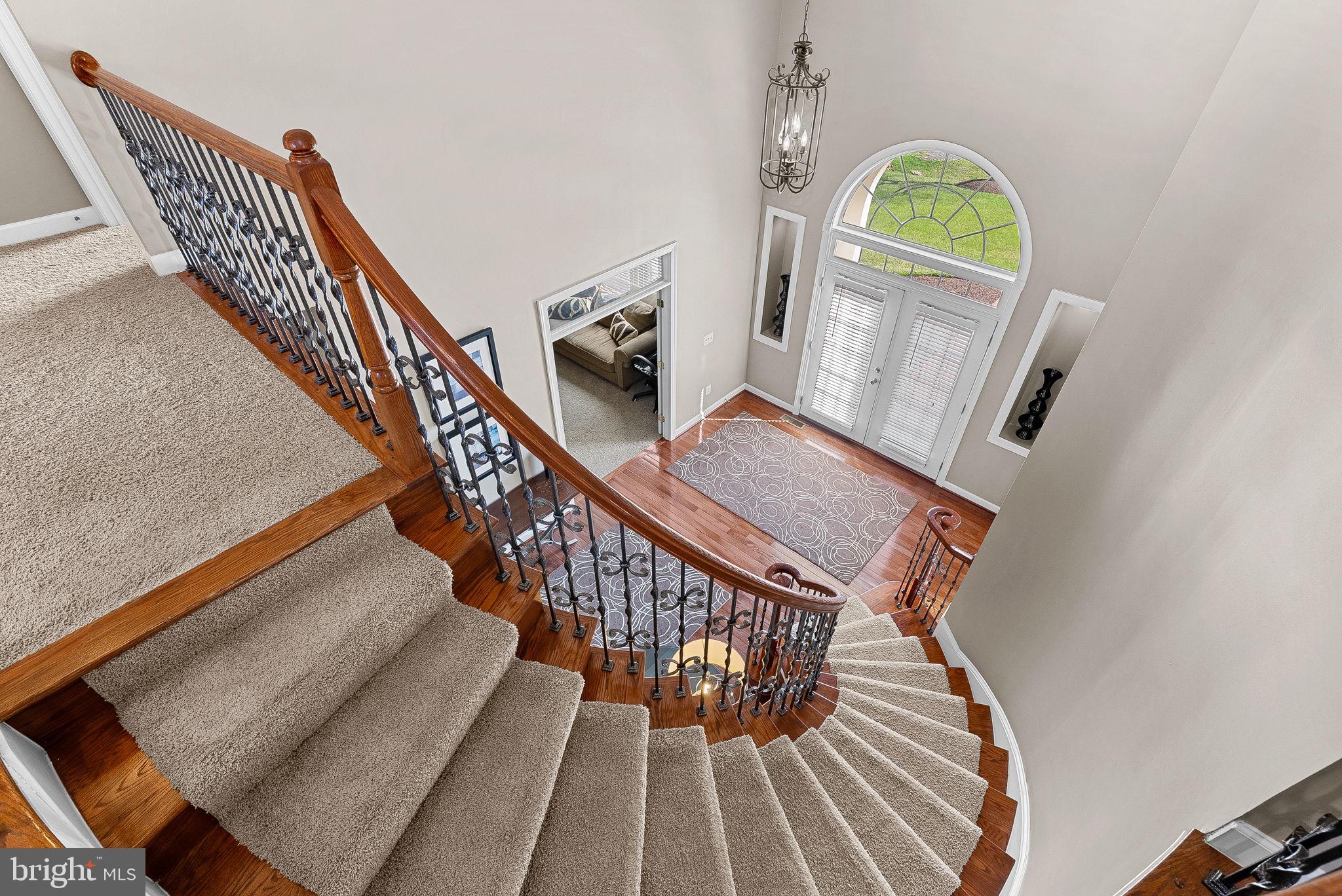 22461 Terra Rosa Place Ashburn, VA 20148 - Photo 20 of 67 a view of entryway and hall with wooden floor