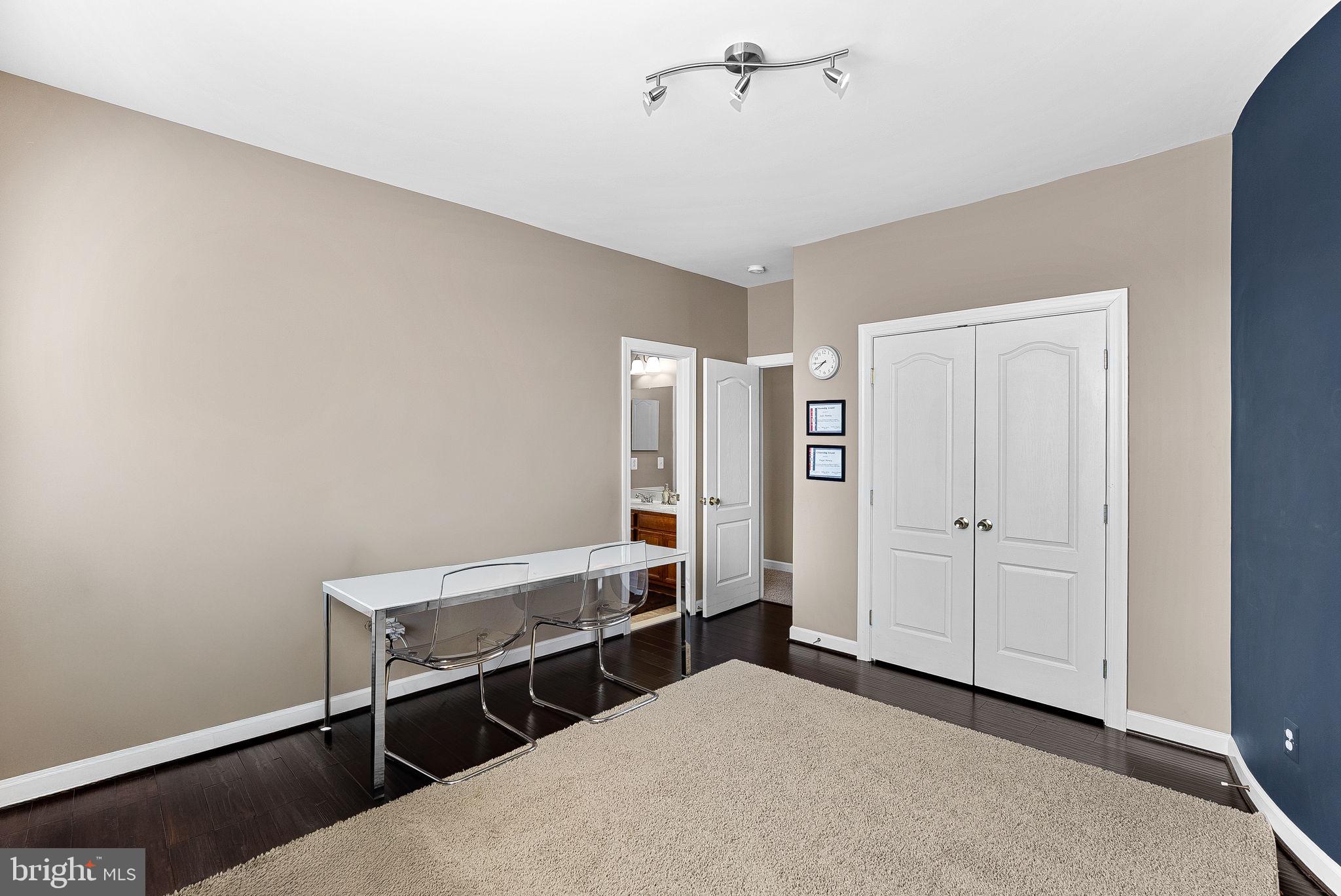 22461 Terra Rosa Place Ashburn, VA 20148 - Photo 33 of 67 a bedroom with a bed and a window