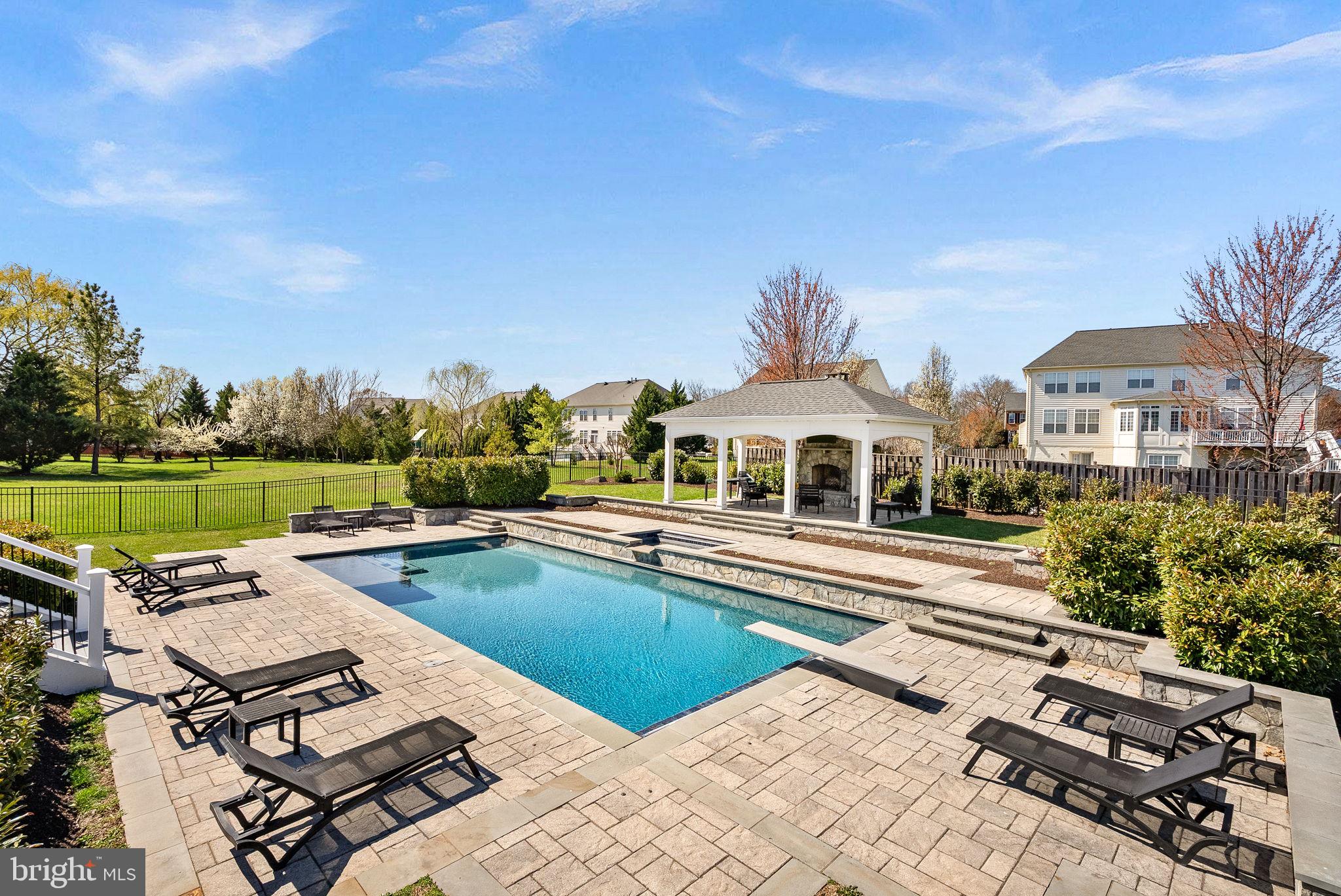 22461 Terra Rosa Place Ashburn, VA 20148 - Photo 58 of 67 an aerial view of a house with swimming pool garden and outdoor seating