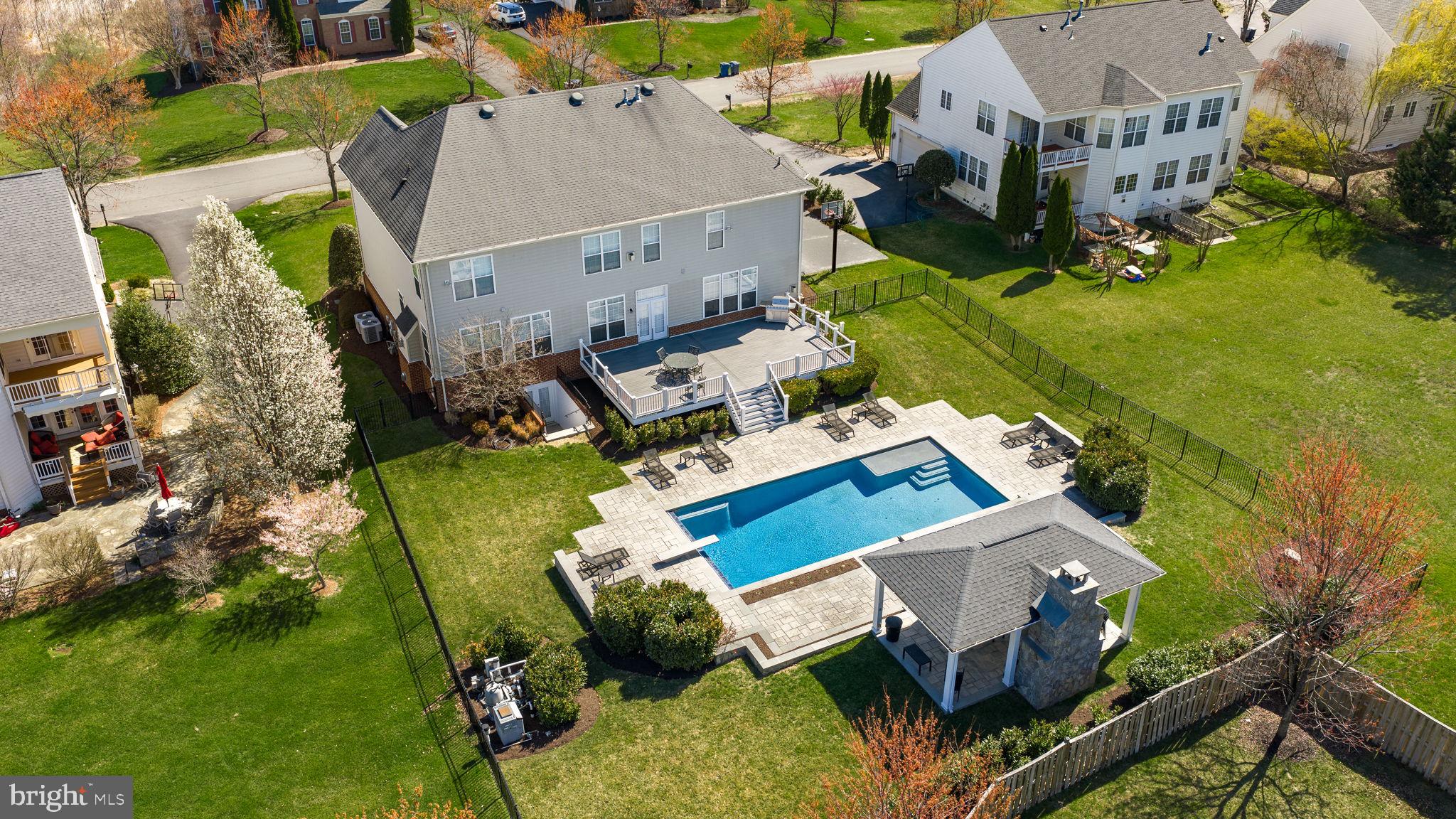 22461 Terra Rosa Place Ashburn, VA 20148 - Photo 60 of 67 an aerial view of a house with a garden