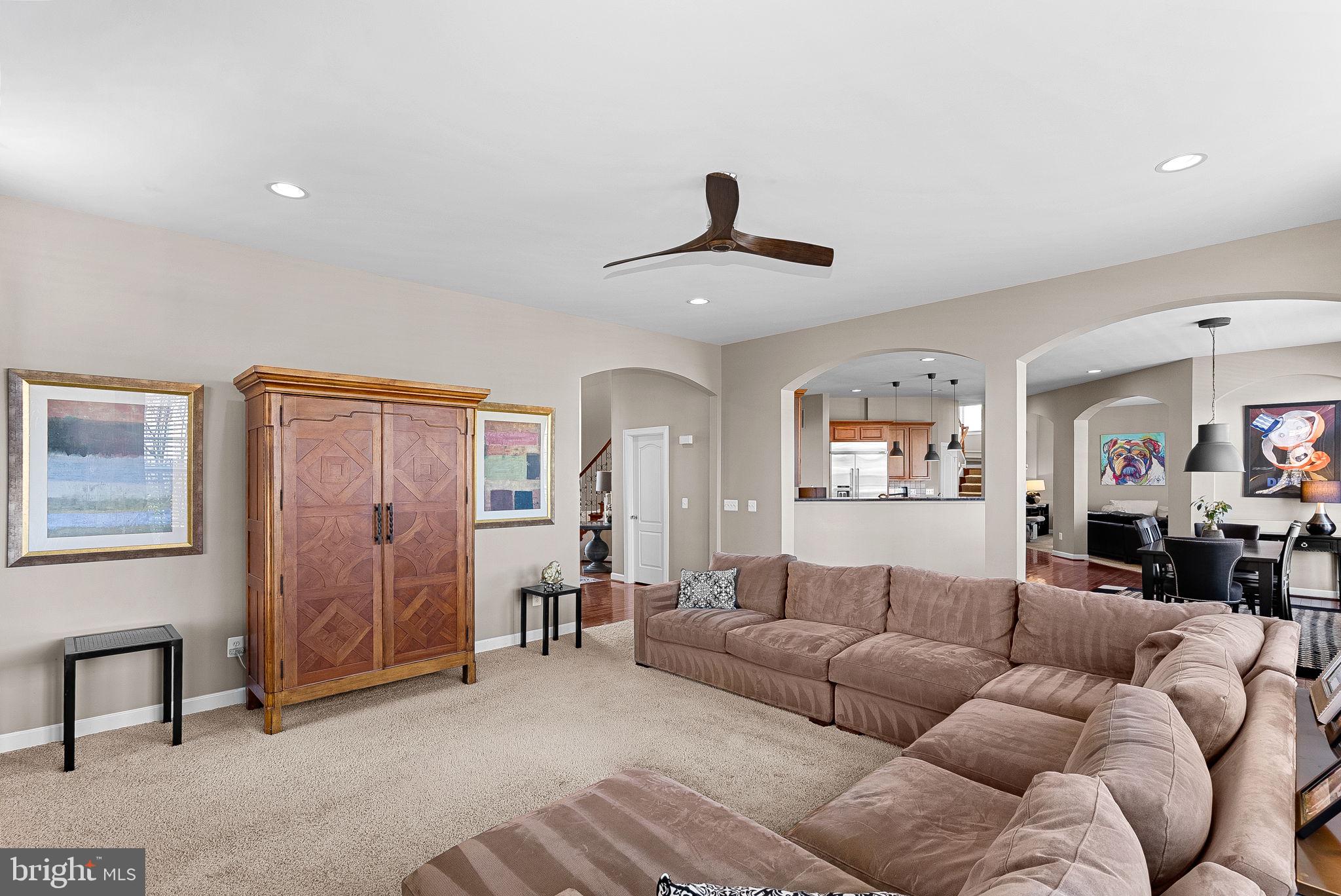 22461 Terra Rosa Place Ashburn, VA 20148 - Photo 9 of 67 a living room with furniture and wooden floor